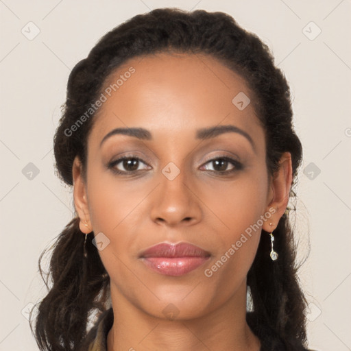 Joyful latino young-adult female with long  brown hair and brown eyes