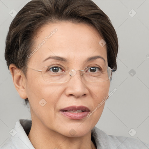 Joyful white adult female with short  brown hair and brown eyes