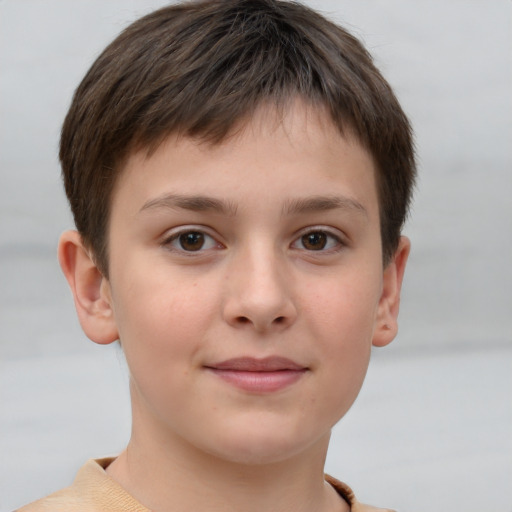 Joyful white child male with short  brown hair and brown eyes