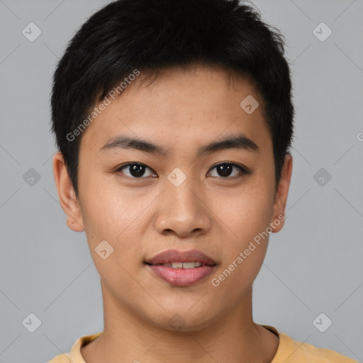 Joyful asian young-adult male with short  black hair and brown eyes