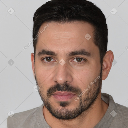 Joyful white young-adult male with short  black hair and brown eyes