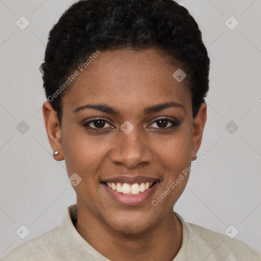 Joyful black young-adult female with short  black hair and brown eyes