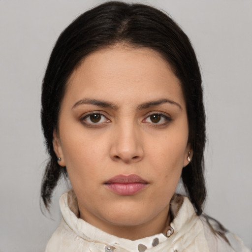 Neutral latino young-adult female with medium  brown hair and brown eyes