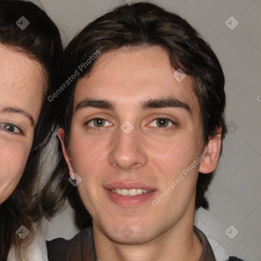 Joyful white young-adult male with medium  brown hair and brown eyes