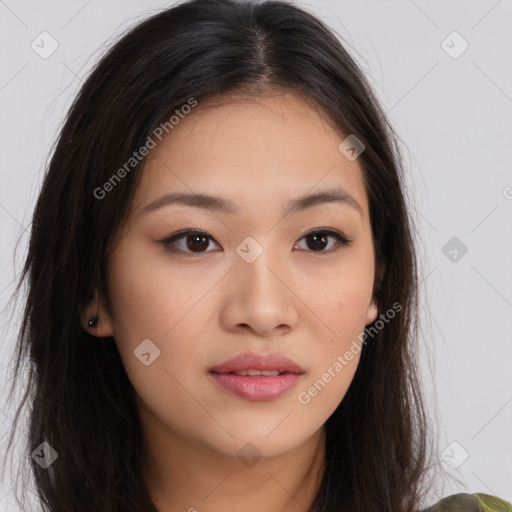 Joyful asian young-adult female with long  brown hair and brown eyes