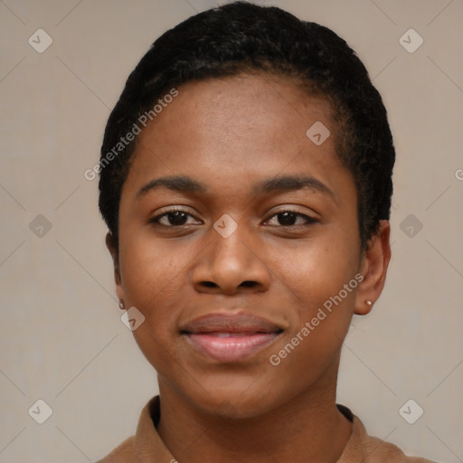 Joyful black young-adult female with short  black hair and brown eyes