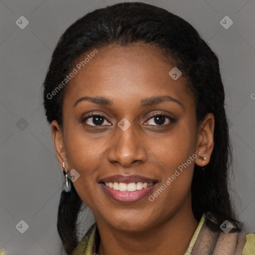 Joyful black young-adult female with medium  black hair and brown eyes