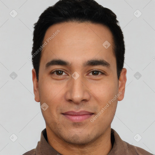 Joyful latino young-adult male with short  black hair and brown eyes