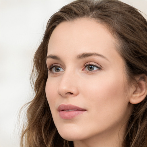 Neutral white young-adult female with long  brown hair and grey eyes