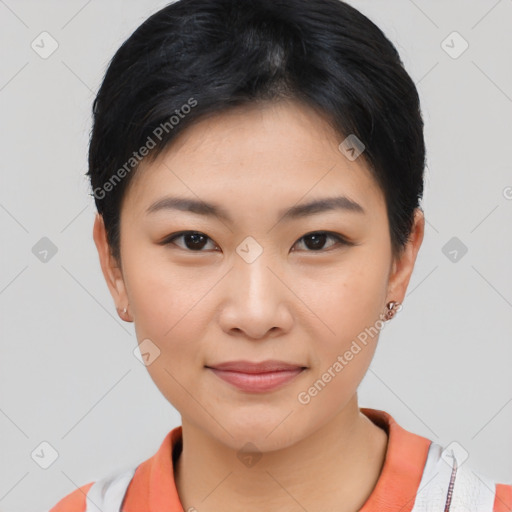 Joyful asian young-adult female with short  black hair and brown eyes