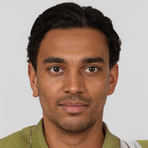 Neutral black young-adult male with short  black hair and brown eyes