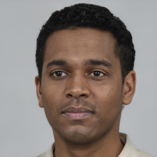 Neutral black young-adult male with short  black hair and brown eyes
