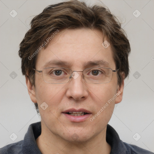 Joyful white adult male with short  brown hair and grey eyes