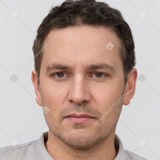 Neutral white adult male with short  brown hair and brown eyes