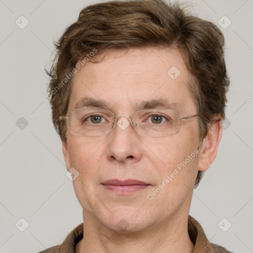 Joyful white adult male with short  brown hair and grey eyes