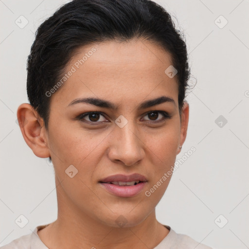 Joyful latino young-adult female with short  brown hair and brown eyes