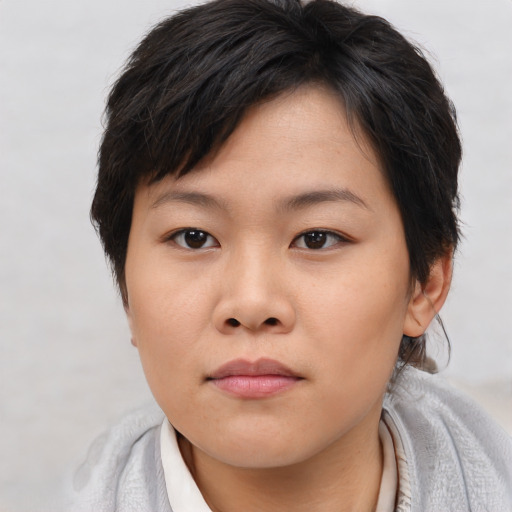 Neutral asian young-adult female with short  brown hair and brown eyes