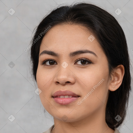 Joyful asian young-adult female with medium  brown hair and brown eyes