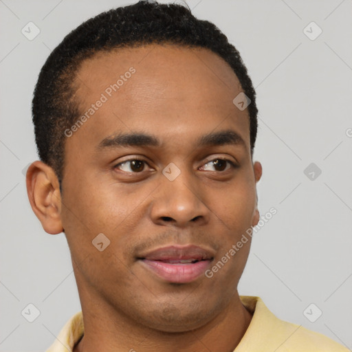 Joyful black young-adult male with short  brown hair and brown eyes