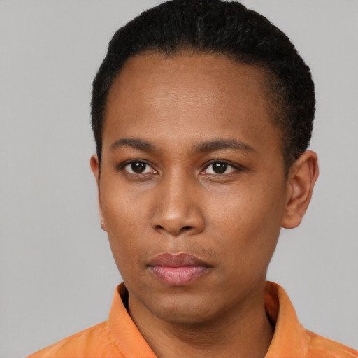 Neutral black young-adult female with short  black hair and brown eyes