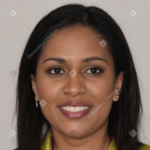 Joyful black young-adult female with long  brown hair and brown eyes