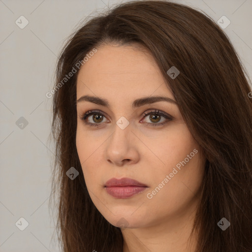 Neutral white young-adult female with long  brown hair and brown eyes