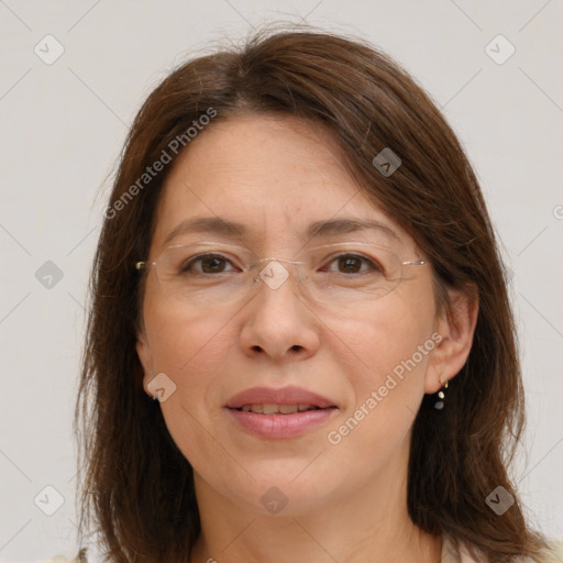 Joyful white adult female with medium  brown hair and grey eyes