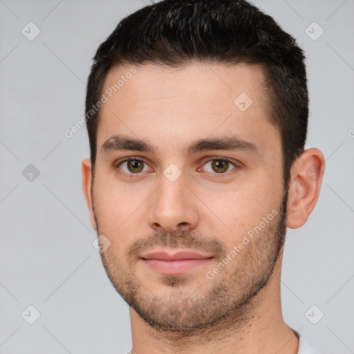 Neutral white young-adult male with short  brown hair and brown eyes