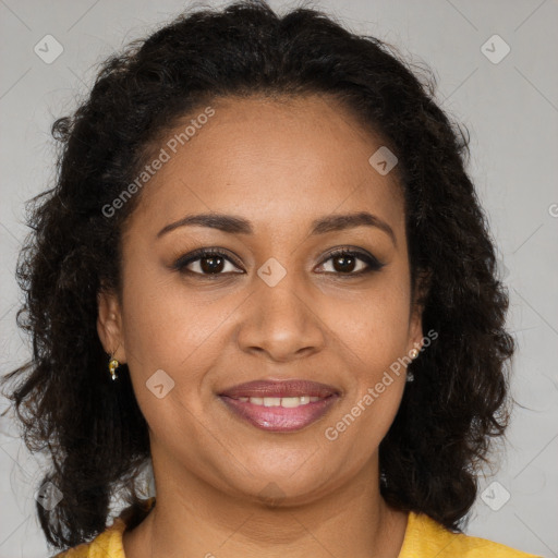 Joyful black young-adult female with medium  brown hair and brown eyes