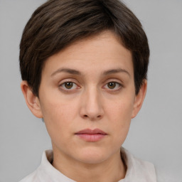 Neutral white young-adult female with short  brown hair and brown eyes