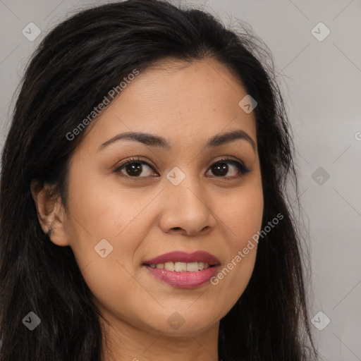 Joyful asian young-adult female with long  brown hair and brown eyes