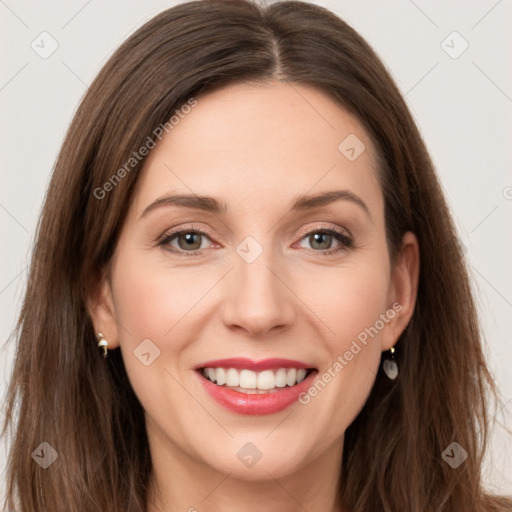 Joyful white young-adult female with long  brown hair and green eyes