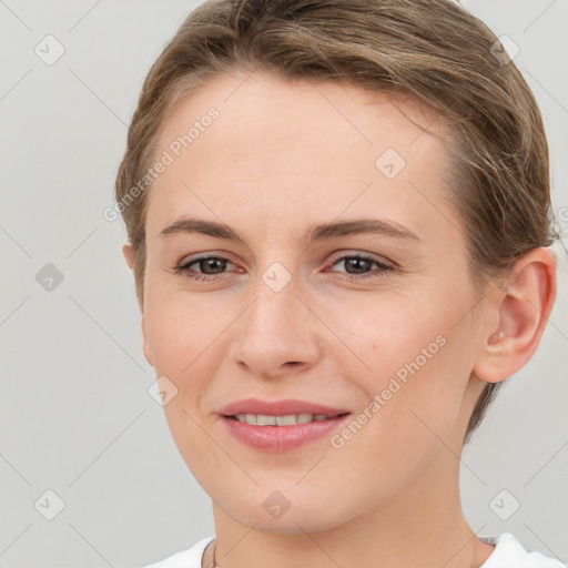 Joyful white young-adult female with short  brown hair and brown eyes