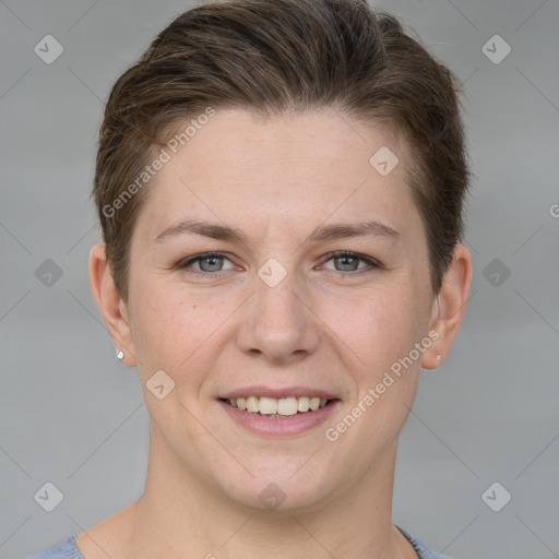 Joyful white young-adult female with short  brown hair and grey eyes