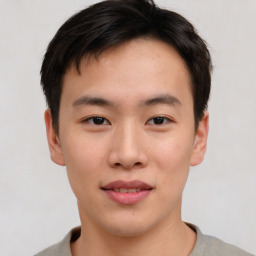 Neutral asian young-adult male with short  brown hair and brown eyes