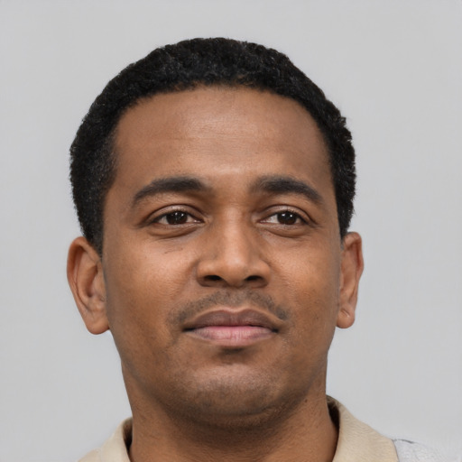 Neutral black young-adult male with short  black hair and brown eyes
