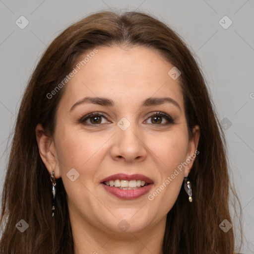 Joyful white adult female with long  brown hair and brown eyes