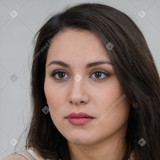 Neutral white young-adult female with long  brown hair and brown eyes