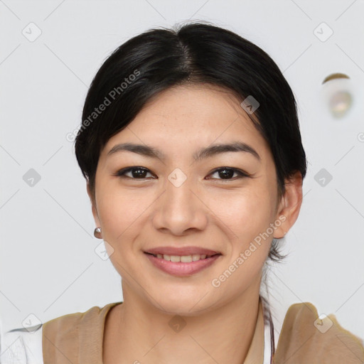 Joyful asian young-adult female with short  brown hair and brown eyes