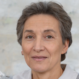 Joyful white middle-aged female with short  brown hair and brown eyes