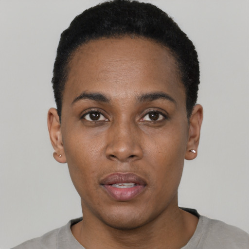 Neutral black young-adult female with short  black hair and brown eyes