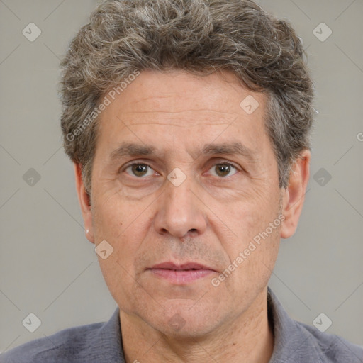 Neutral white middle-aged male with short  brown hair and brown eyes