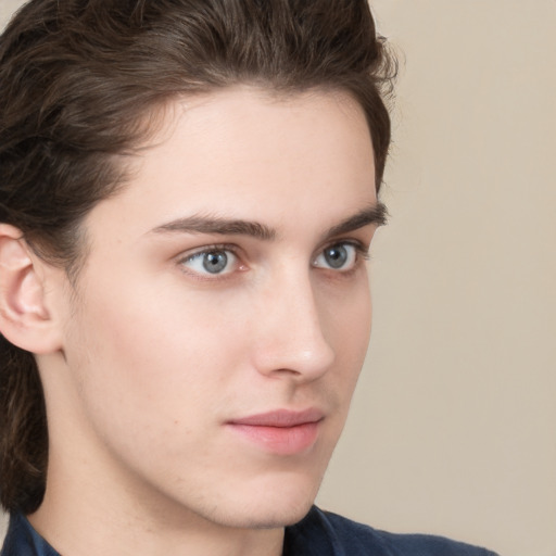 Neutral white young-adult male with medium  brown hair and brown eyes