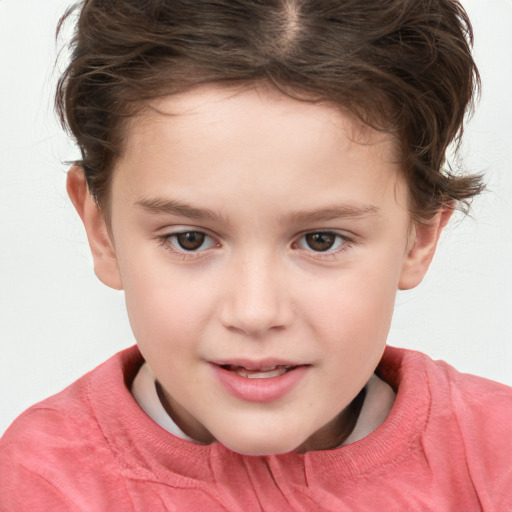 Joyful white child female with short  brown hair and brown eyes