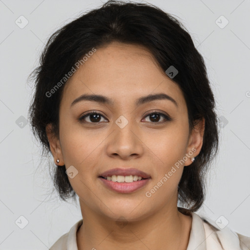 Joyful latino young-adult female with medium  brown hair and brown eyes