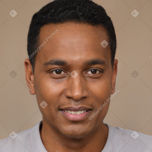 Joyful black young-adult male with short  black hair and brown eyes