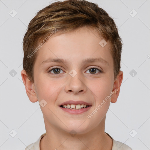 Joyful white child male with short  brown hair and brown eyes