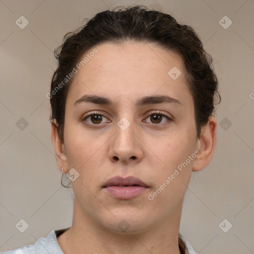 Neutral white young-adult female with short  brown hair and brown eyes