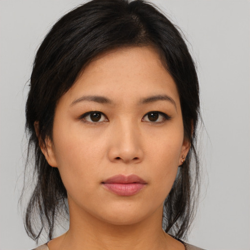 Neutral asian young-adult female with medium  black hair and brown eyes