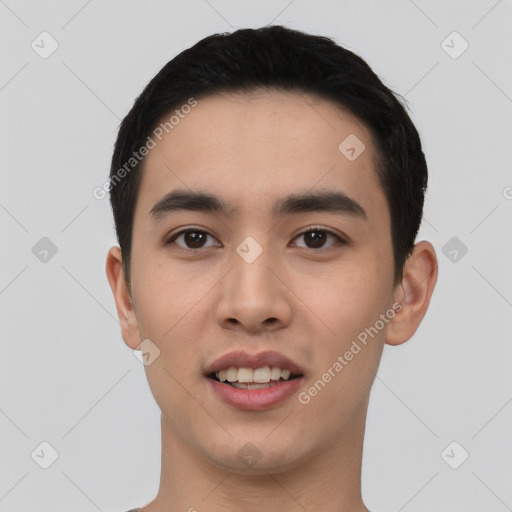 Joyful asian young-adult male with short  black hair and brown eyes